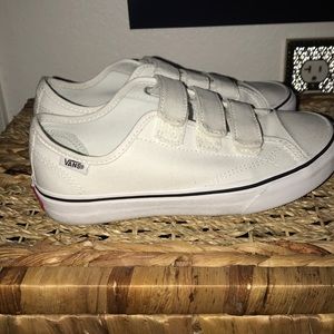 All white Vans style 23v